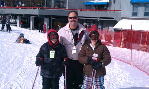 Rob and kids skiing